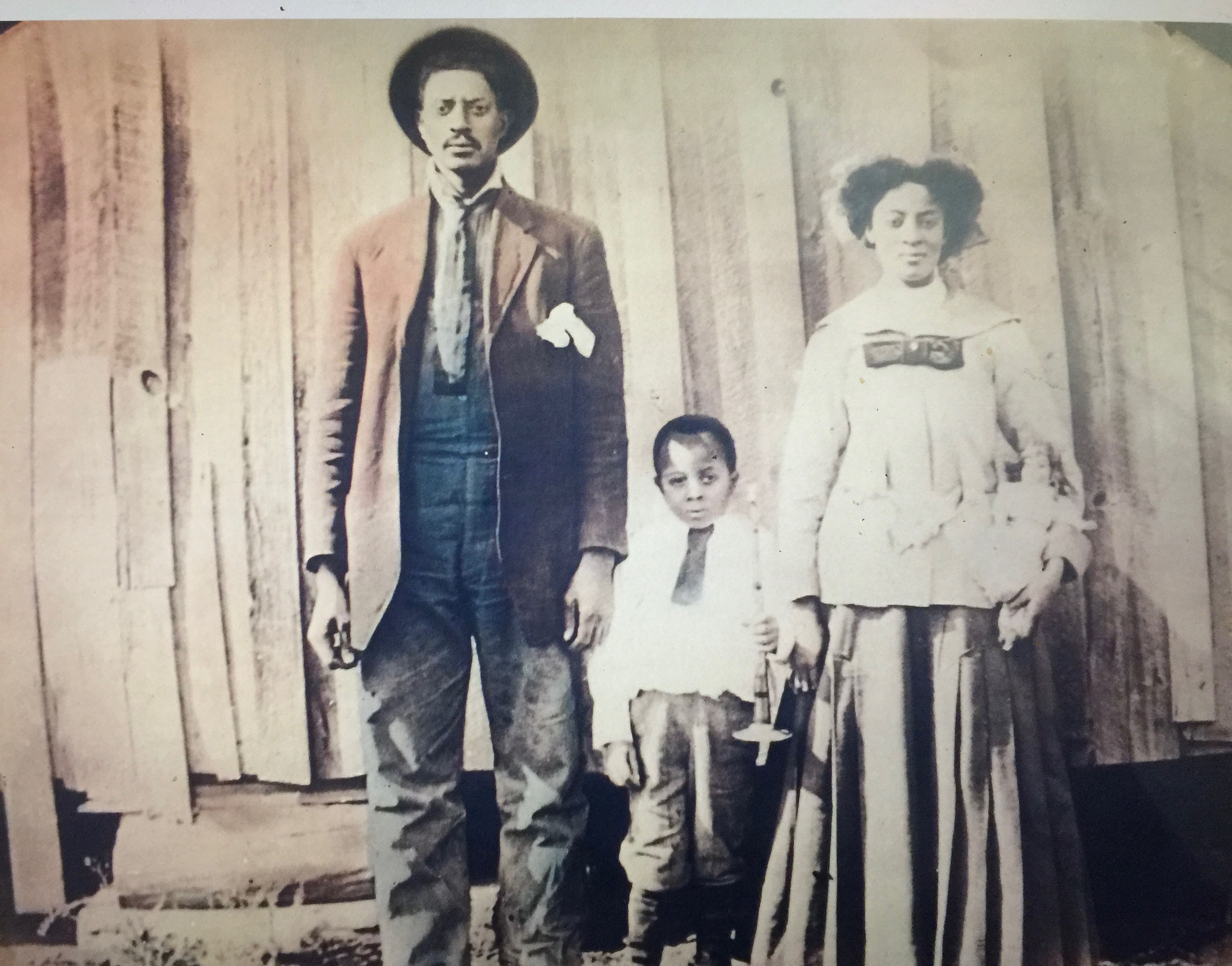 Historic Steward family portrait - a man, woman, and child in early 1900s attire